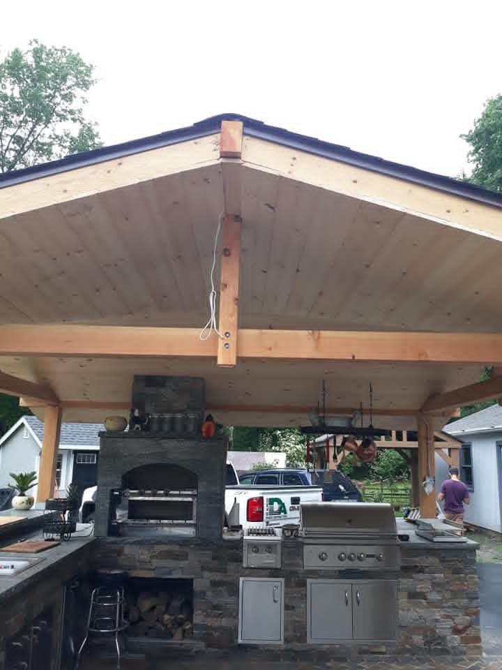 Pavilion with outdoor kitchen and pizza oven