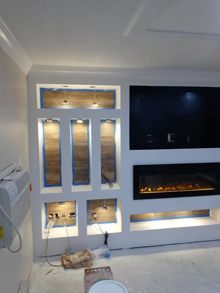 Built-in wall unit with fireplace and TV