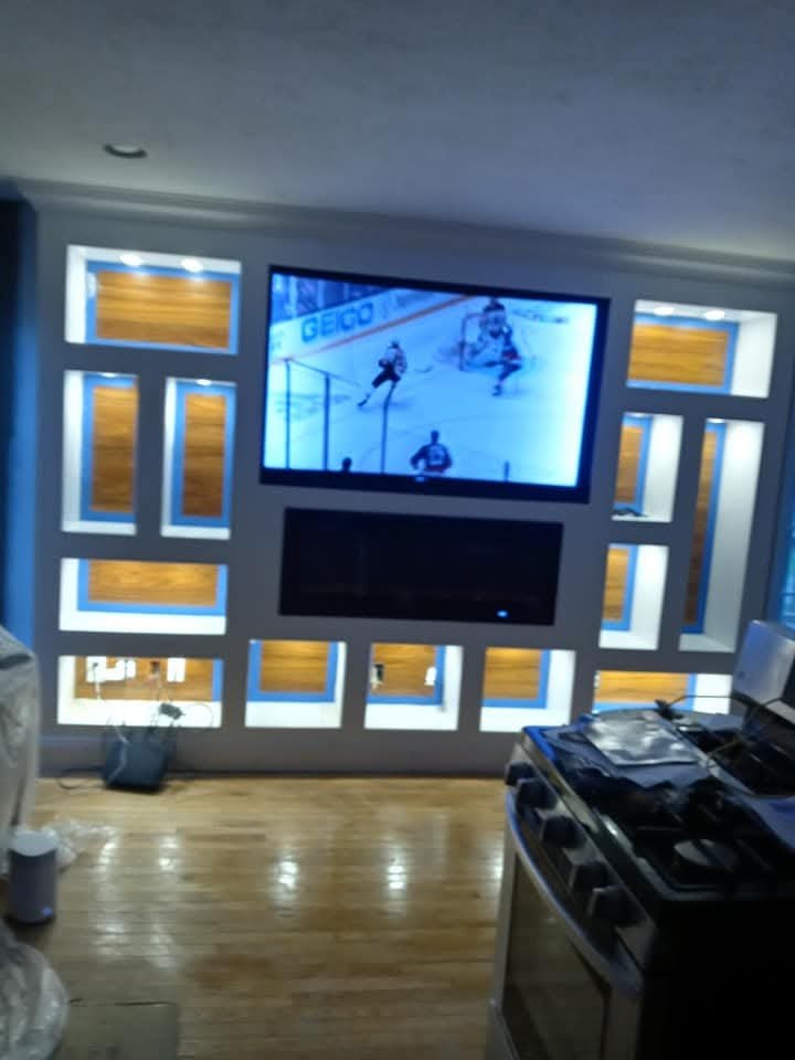 Custom built-in entertainment wall with lighting